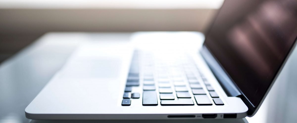 shallow-focus-photography-of-macbook